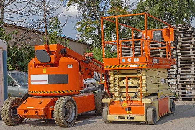 forklift carrying pallets in a warehouse in Hillside